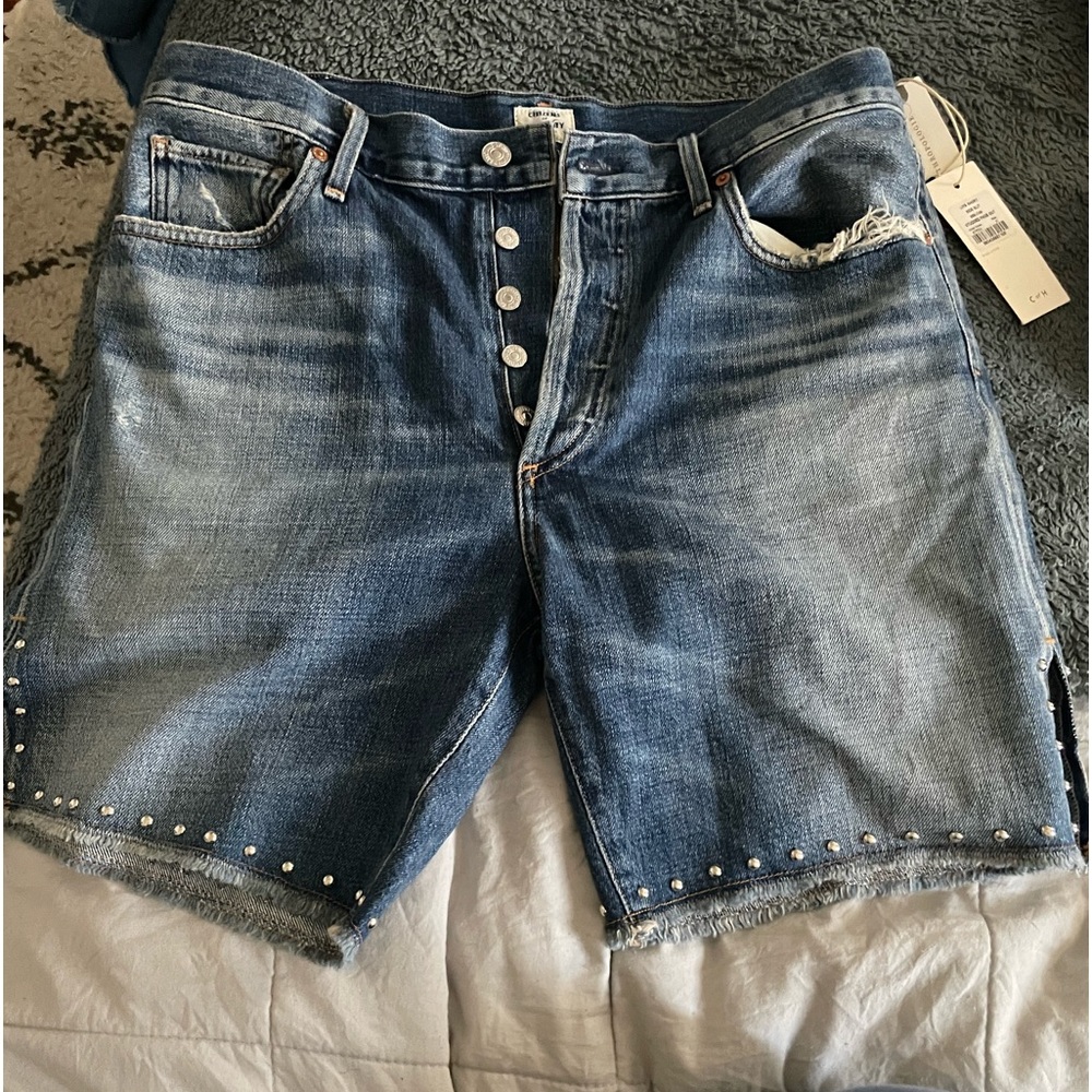 NWT Citizens of Humanity Liya side slit studded fade out raw edge shorts.